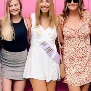 Lulu’s white romper with side tie